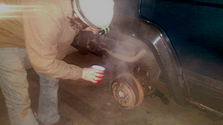 The rear drum brakes are locking up and getting very hot.